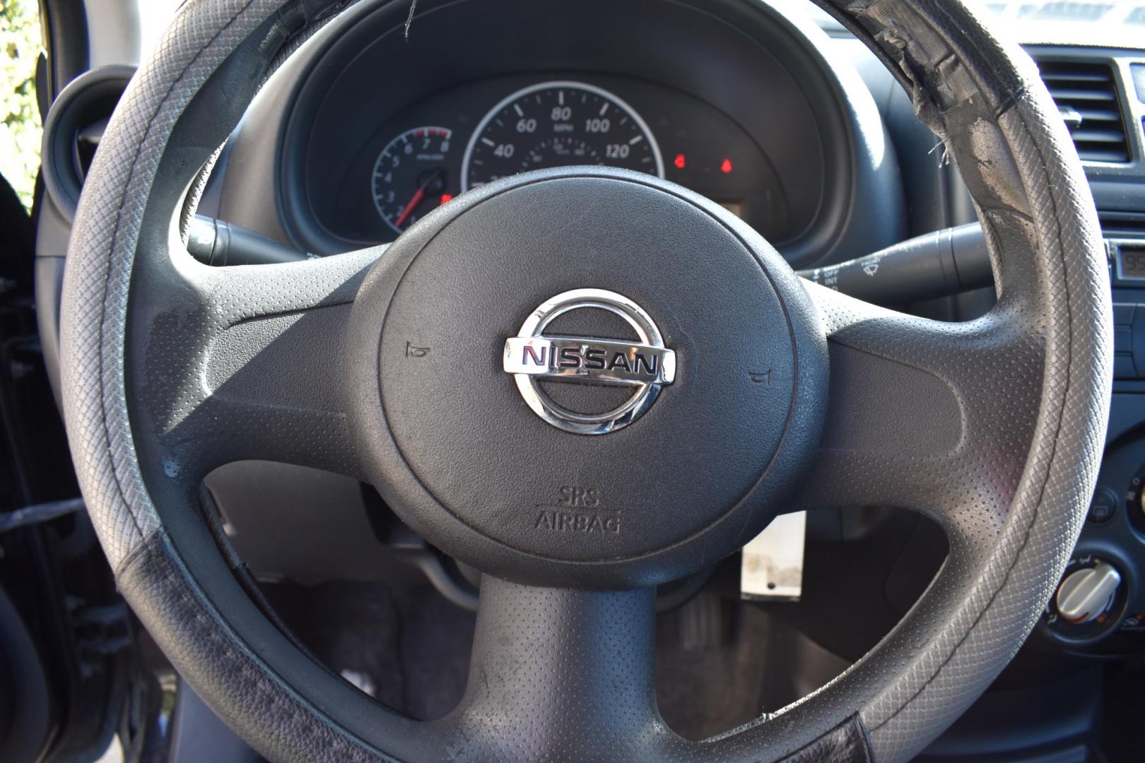 2014 Black /Black Nissan Versa 1.6 S 5M (3N1CN7AP2EL) with an 1.6L L4 DOHC 16V engine, CVT transmission, located at 5925 E. BELKNAP ST., HALTOM CITY, TX, 76117, (817) 834-4222, 32.803799, -97.259003 - The 2014 Nissan Versa 1.6 S 5M offers several benefits, including its fuel efficiency, spacious interior, and affordable price tag. It's also known for its reliability and low maintenance costs, making it a practical choice for budget-conscious buyers. Additionally, its simple yet functional design - Photo#8